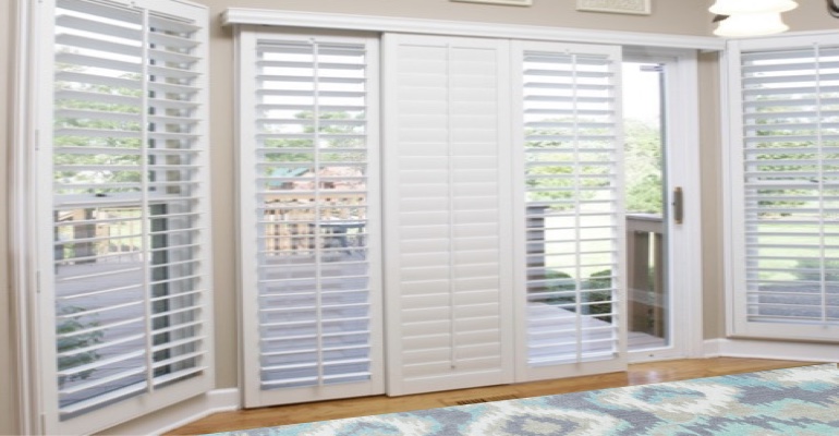 [Polywood|Plantation|Interior ]211] shutters on a sliding glass door in Gainesville